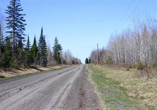 Aerial view of Michigan's Baraga County 5-acre Abby Point property with electricity access, ideal for land buyers.