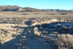 Aerial view of Nevada Elko County Gamble District 80-acre land parcel in T40N R66E Section 25, offered by Onlinelandsales.