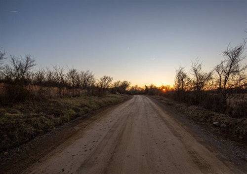 Aerial view of Oklahoma Pittsburg County 5.32-acre Painted Horse lot 34, featuring open land and natural landscape.