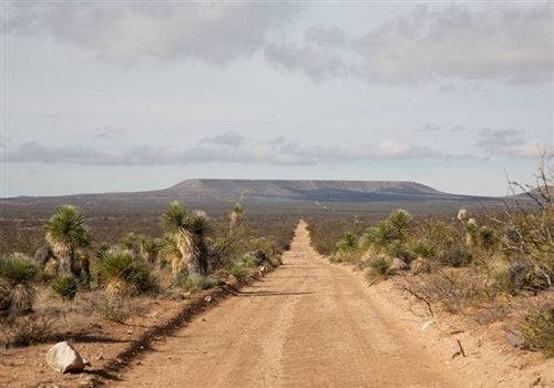 Aerial view of Sunset Ranches Lot 30 in Hudspeth County, Texas, with scenic desert landscape and open 10-acre property.