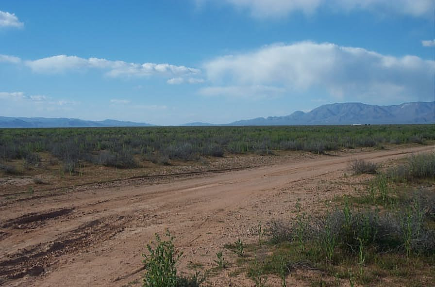 Aerial view of Arizona Mohave County Lake Mead Rancheros Unit 10 Lot 2510 near Kaibito Blvd, showcasing land and surrounding desert landscape.