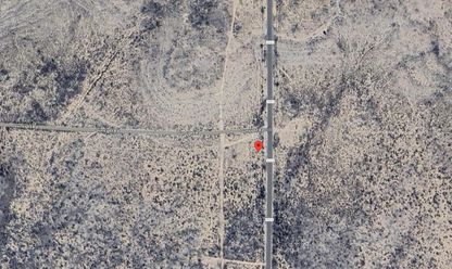 Aerial view of Texas Hudspeth County land parcel, Eastern Hills Lot 10, showing dry terrain and natural landscape features.