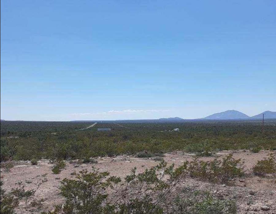 Aerial view of Texas Hudspeth County land parcel, showing the 0.14-acre Eastern Hills Lot 10 in natural desert landscape.
