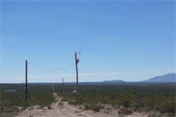 Aerial view of a Texas Eastern Hills lot in Hudspeth County, showing undeveloped land with surrounding natural terrain.